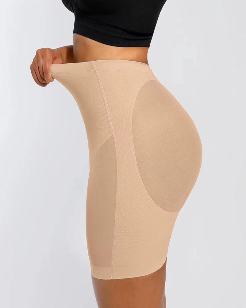E.Pantalones cortos moldeadores BBL de cintura media con compresión firme y cómoda. Moldean abdomen, cintura y piernas mientras realzan los glúteos gracias a su corte en V en la parte trasera para un efecto más definido y natural.